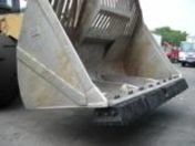 A large truck with stairs going down it
