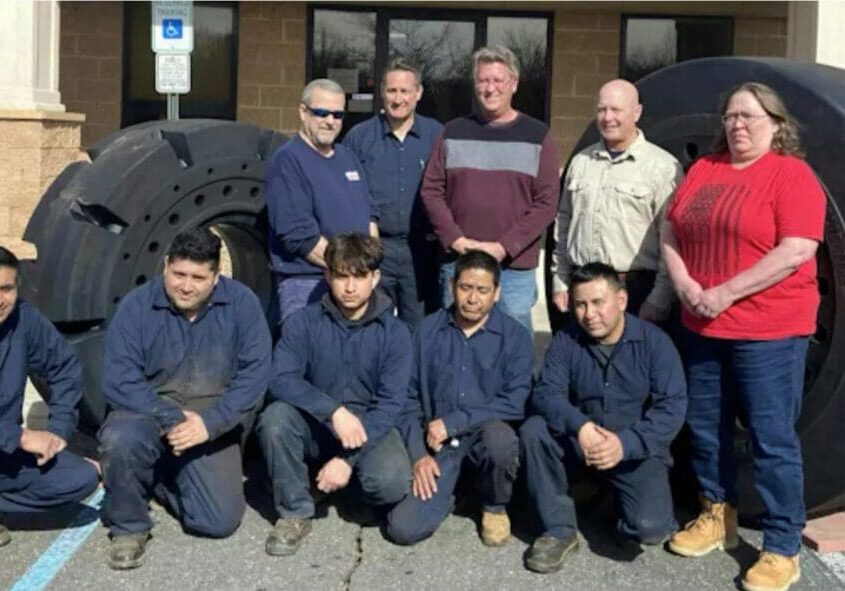 A group of men standing next to each other.